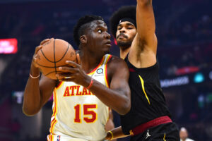 Cleveland Cavaliers center Jarrett Allen defends Atlanta Hawks center Clint Capela