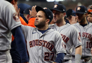 Houston Astros second baseman Jose Altuve celebrates with teammates after defeating the Atlanta Braves in Game 5 of the 2021 World Series at Truist Park