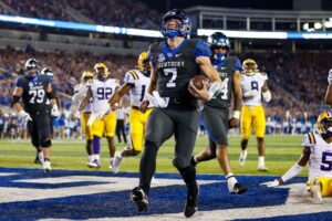 entucky Wildcats quarterback Will Levis runs the ball for a touchdown against LSU