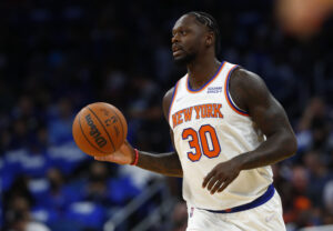 New York Knicks forward Julius Randle dribbles the ball against the Orlando Magic