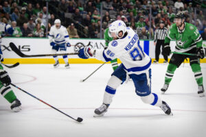 Tampa Bay Lightning player Nikita Kucherov taking a shot against the Dallas Stars