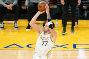 Dallas Mavericks player Luka Doncic rises to shoot the basketball