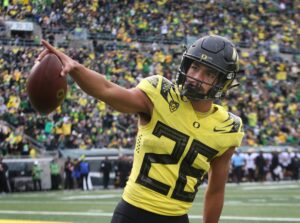 Oregon running back Travis Dye celebrates his second quarter touchdown against Colorado