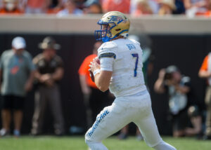 Tulsa Golden Hurricane quarterback Davis Brin drops back to pass in a game