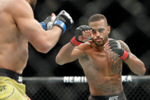 Danny Roberts looks for an opening to throw a punch against Michael Pereira (face not pictured) during UFC Fight Night