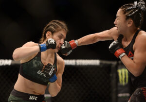 Carla Esparza (right) connects with a straight right hand to the nose of Alexa Grasso (left) during UFC Fight Night