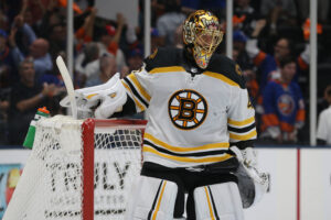 Boston Bruins goalie Tuukka Rask reacts after allowing a goal against the New York Islanders