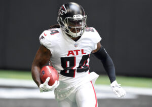 Atlanta Falcons running back Cordarrelle Patterson (84) returns the ball against the Philadelphia Eagles during the first quarter at Mercedes-Benz Stadium.