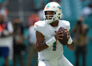 Miami Dolphins quarterback Tua Tagovailoa looks downfield in a 2021 road game.