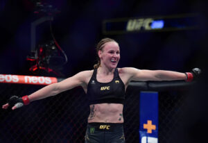 Valentina Shevchenko celebrates her TKO victory against Lauren Murphy during UFC 266 at T-Mobile Arena.