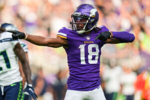 Minnesota Vikings wide receiver #18 Justin Jefferson celebrates a first down against the Seahawks.