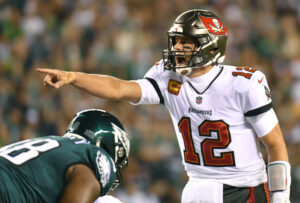 Tampa Bay Buccaneers quarterback Tom Brady (12) calls a play at the line of scrimmage during a game against the Philadelphia Eagles