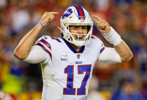 Buffalo Bills quarterback Josh Allen hollers out signals during a 2021-22 regular-season game.