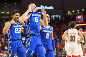 Nov 16, 2021; Lincoln, Nebraska, USA; Creighton Bluejays guard Alex O'Connell (5) and guard Trey Alexander (23) and guard Ryan Nembhard (2) react after the win against the Nebraska Cornhuskers at Pinnacle Bank Arena. 