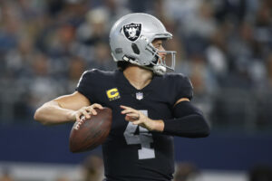 Las Vegas Raiders quarterback Derek Carr (4) throws a pass in the second quarter against the Dallas Cowboys at AT&T Stadium.