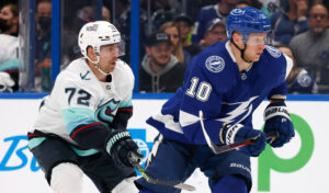 Seattle Kraken right wing Joonas Donskoi (72) chases Tampa Bay Lightning right wing Corey Perry (10) during the first period at Amalie Arena. 