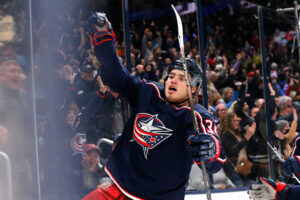 Columbus Blue Jackets center Cole Sillinger celebrates after scoring a goal against the San Jose Sharks