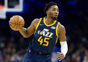 Utah Jazz guard Donovan Mitchell dribbles the ball against the Philadelphia 76ers