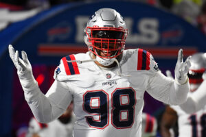 New England Patriots defensive tackle Carl Davis gestures to the crowd prior to a game against the Buffalo Bills