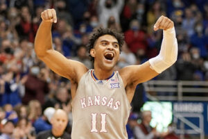 Kansas Jayhawks guard Remy Martin celebrates after making a basket against the Nevada Wolf Pack