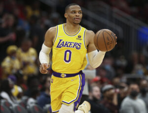 Los Angeles Lakers guard Russell Westbrook dribbles the ball upcourt during a game against the Houston Rockets