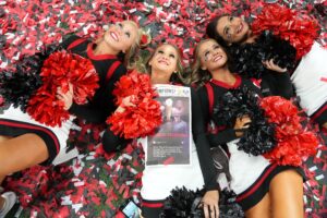 Jan 10, 2022; Indianapolis, IN, USA; Georgia Bulldogs cheerleaders celebrate on a confetti covered field after defeating the Alabama Crimson Tide in the 2022 CFP college football national championship game at Lucas Oil Stadium. Mandatory Credit: Kirby Lee-USA TODAY Sports