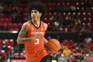 Illinois Fighting Illini guard Andre Curbelo dribbles during a Big Ten basketball game against the Maryland Terrapins