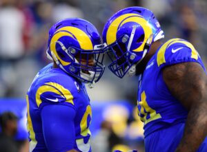 Los Angeles Rams defensive end Aaron Donald (left) and defensive end A'Shawn Robinson (right) butt heads before the start of the NFC Championship Game against the San Francisco 49ers