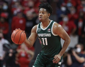 Saturday College Basketball Odds - Michigan State Spartans guard A.J. Hoggard dribbles up court against the Rutgers Scarlet Knights during a Big Ten basketball game