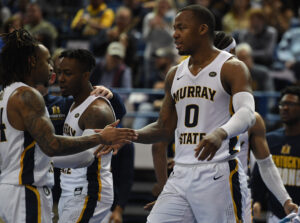 Murray State Racers forward KJ Williams (right) is congratulated by teammates after a basket during the second half against the Tennessee State Tigers