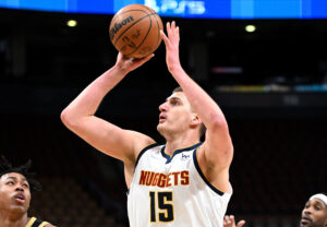 Denver Nuggets center Nikola Jokic shoots the ball against the Toronto Raptors