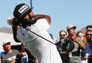 Sahith Theegala tees off on the 10th hole during Round 3 at the WM Phoenix Open.