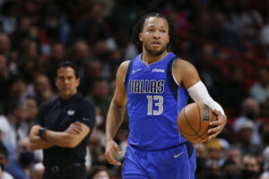 Dallas Mavericks guard Jalen Brunson (13) dribbles during the second quarter of the game against the Miami Heat at FTX Arena.