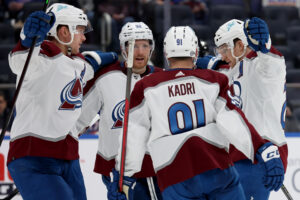 Colorado Avalanche teammates celebrate Mikko Rantanen's goal against the New York Islanders