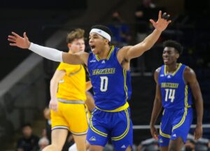 Delaware's Jameer Nelson, Jr. reacts to an unforced Towson turnover in the first half of a CAA tournament semifinal at the Entertainment & Sports Arena in Washington, D.C., Monday, March 7, 2022.