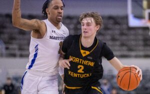 Tuesday College Basketball Odds - Northern Kentucky Norse guard Sam Vinson (2) works around defense by IPFW Mastodons guard Jarred Godfrey (1), Monday, March 7, 2022, during Horizon League tournament men’s semifinal action from Indianapolis’ Indiana Farmers Coliseum. NKU won 57-43.