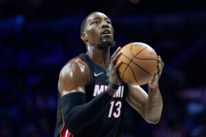 Miami Heat center Bam Adebayo (13) shoots a free throw against the Philadelphia 76ers during the second quarter at Wells Fargo Center. 