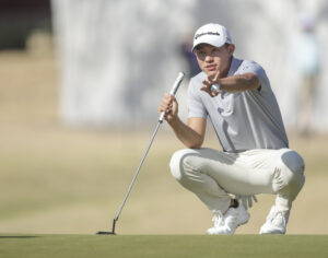 Mar 26, 2022; Austin, Texas, USA; Colin Morikawa lines up his putt on the 6th hole during the fourth round of the World Golf Championships-Dell Technologies Match Play golf tournament.