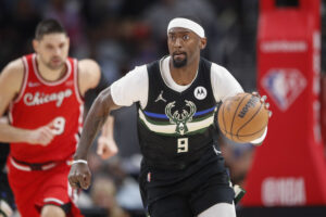 Milwaukee Bucks center Bobby Portis (9) brings the ball up court against the Chicago Bulls during the first half at United Center.