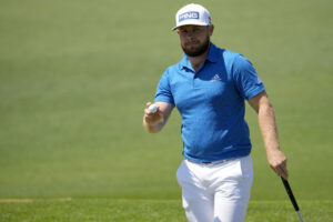 Tyrrell Hatton walks off no. 2 green during the first round of The Masters golf tournament at Augusta National Golf Club. 