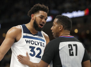 Minnesota Timberwolves center Karl-Anthony Towns (32) speaks to a referee during the second half of game two of the first round for the 2022 NBA playoffs against the Memphis Grizzlies at FedExForum in Memphis on Tuesday, April 19, 2022.