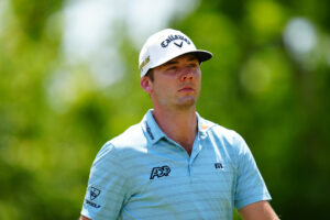 Sam Burns walks the fifth hole fairway during the first round of the Zurich Classic of New Orleans golf tournament. 