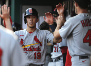 St. Louis Cardinals second baseman Tommy Edman (19) reacts with teammates after scoring against the Cincinnati Reds during the fifth inning at Great American Ball Park.