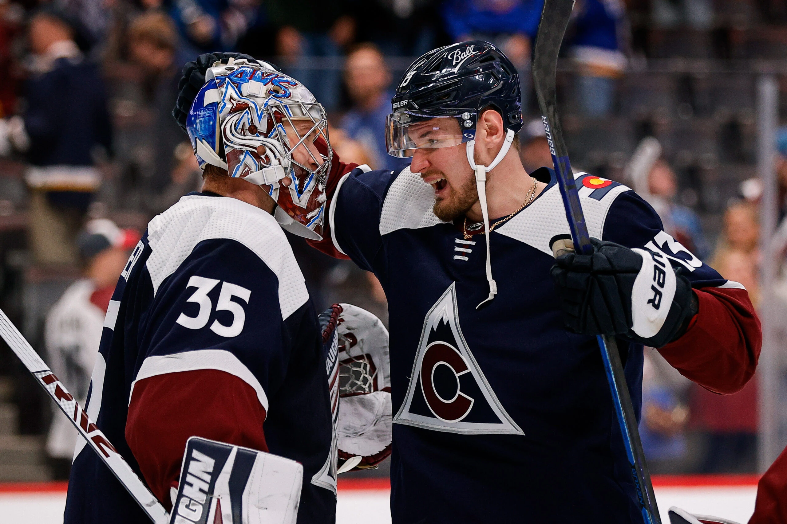 Colorado Avalanche right wing Valeri Nichushkin (13) celebrates with goaltender Darcy Kuemper (35) after the game against the St. Louis Blues at Ball Arena