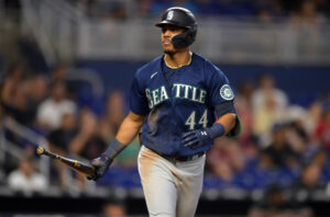 Seattle Mariners center fielder Julio Rodriguez (44) tosses his bat aside after hitting a three-run home run against the Miami Marlins in the sixth inning at loanDepot Park.