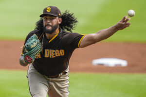 San Diego Padres left-handed starting pitcher Sean Manaea releases the ball as he delivers a pitche against the Atlanta Braves