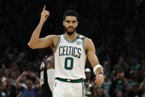 Boston Celtics forward Jayson Tatum (0) celebrates during the second half of their win over the Milwaukee Bucks in game seven of the second round of the 2022 NBA playoffs at TD Garden.