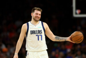 Dallas Mavericks guard Luka Doncic (77) reacts against the Phoenix Suns in game seven of the second round for the 2022 NBA playoffs at Footprint Center.