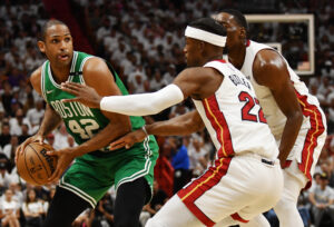 Miami Heat forward Jimmy Butler (22) defends Boston Celtics center Al Horford (42) during the first half of game two of the 2022 eastern conference finals at FTX Arena.