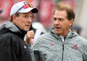 Alabama football coach Nick Saban, right, talks to Texas A&M coach Jimbo Fisher, left, during a previous game.